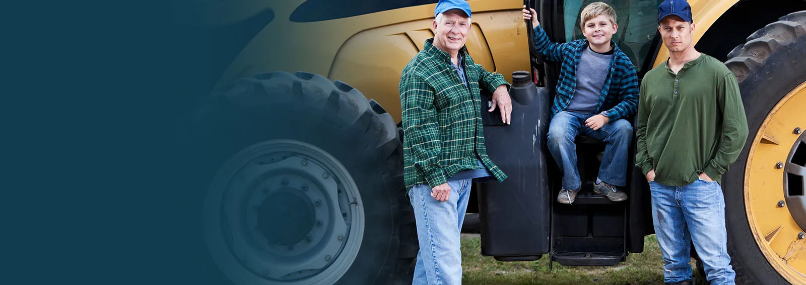 Multigenerational farm family sitting by a tractor.