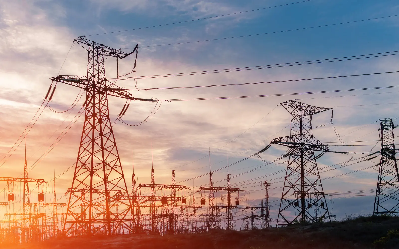 Silhouette of Power Supply Facilities at Sunset