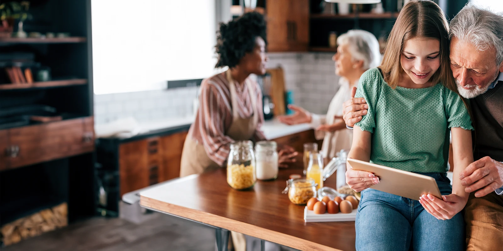 multigenerational family socializing in the kitchen