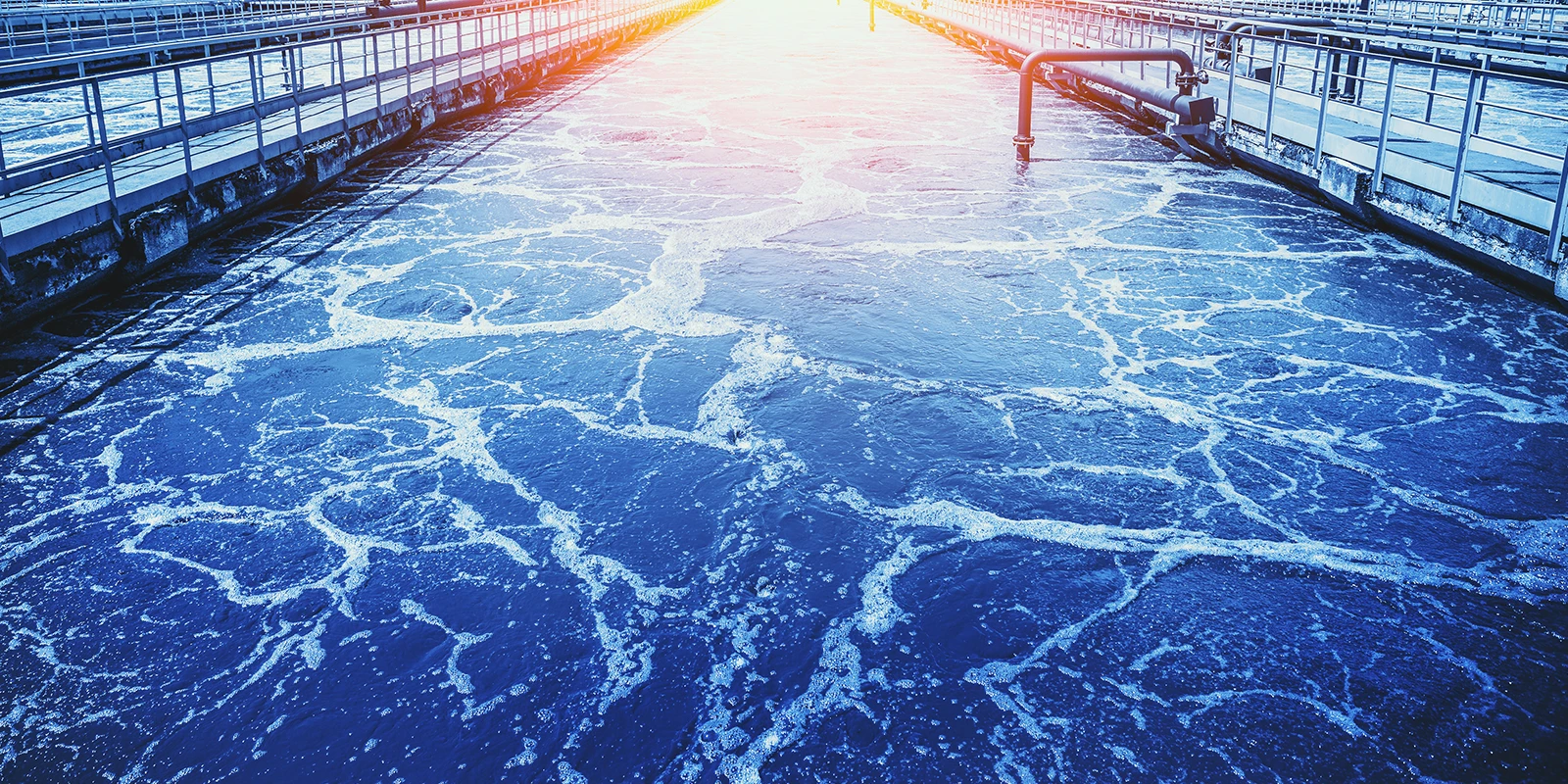 A water treatment plant at sunset.